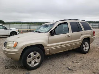 2001 Jeep Grand Cherokee Limited with VIN 1J4GW58S11C649736, listed as a Copart auction lot 66080214 with 199,584 mi miles and Salvage Title. Bid and sale history available at carsss.com. Image 1.
