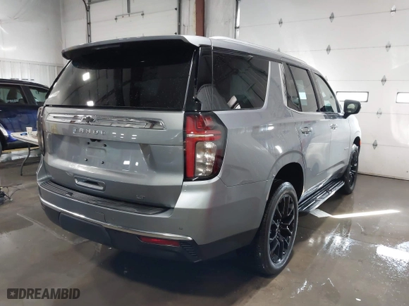 2023 Chevrolet Tahoe LT with VIN 1GNSKNKDXPR504598, listed as a IAAI auction lot 41383754 with 23,033 mi miles. Bid and sale history available at carsss.com. Image 4.