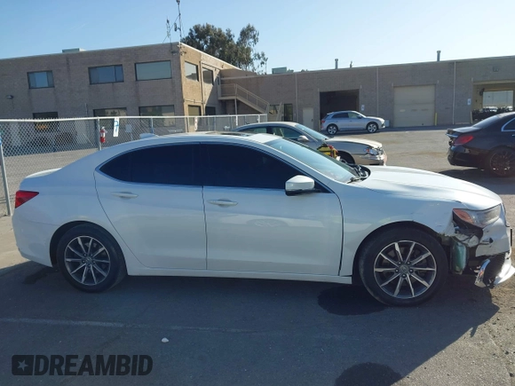 2020 Acura TLX with VIN 19UUB1F3XLA014040, listed as a IAAI auction lot 42385420 with 140,740 mi miles and . Bid and sale history available at DreamBid. Image 13.