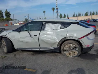 2024 Kia EV6 Wind with VIN KNDC34LA1R5214852, listed as a IAAI auction lot 41818262 with 14,950 mi miles and . Bid and sale history available at DreamBid. Image 14.