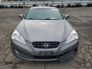 2010 Hyundai Genesis Coupe Grand Touring z VIN KMHHU6KH2AU042270, wystawiony jako Copart lot #82710674 z przebiegiem 56 592 mil mil oraz Szkoda całkowita • Salvage title. Historia ofert i sprzedaży dostępna na DreamBid. Obrazek 5.
