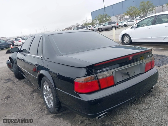 2002 Cadillac Seville Touring STS with VIN 1G6KY54982U239673, listed as a IAAI auction lot 41657709 with 92,224 mi miles. Bid and sale history available at carsss.com. Image 3.