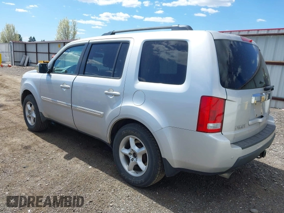 2009 Honda Pilot Touring with VIN 5FNYF48969B018075, listed as a IAAI auction lot 42052333 with 206,700 mi miles and . Bid and sale history available at carsss.com. Image 3.