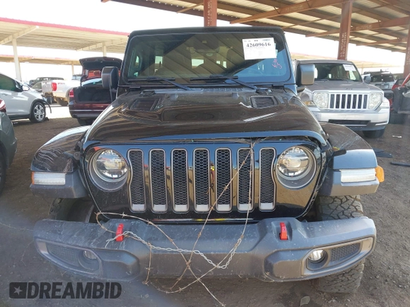 2019 Jeep Wrangler Unlimited Rubicon with VIN 1C4HJXFN5KW522991, listed as a IAAI auction lot 42609616 with 111,844 mi miles and . Bid and sale history available at DreamBid. Image 13.