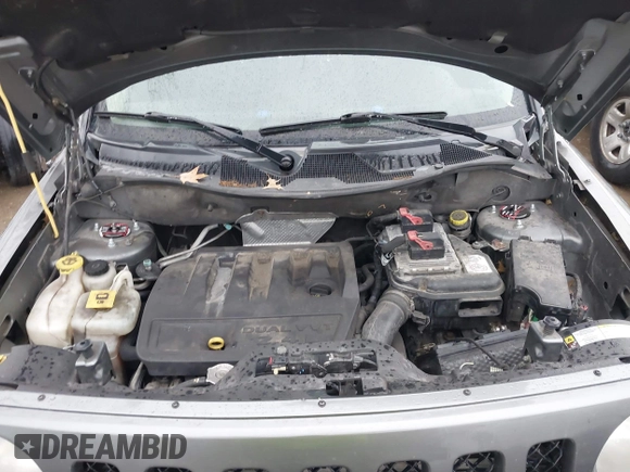 2013 Jeep Patriot Latitude with VIN 1C4NJPFB8DD129848, listed as a IAAI auction lot 40949386 with 168,839 mi miles and . Bid and sale history available at carsss.com. Image 10.