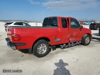 2002 Ford F-150 XL with VIN 2FTRX07WX2CA98348, listed as a Copart auction lot 43705135 with 204,718 mi miles and Salvage Title. Bid and sale history available at carsss.com. Image 3.