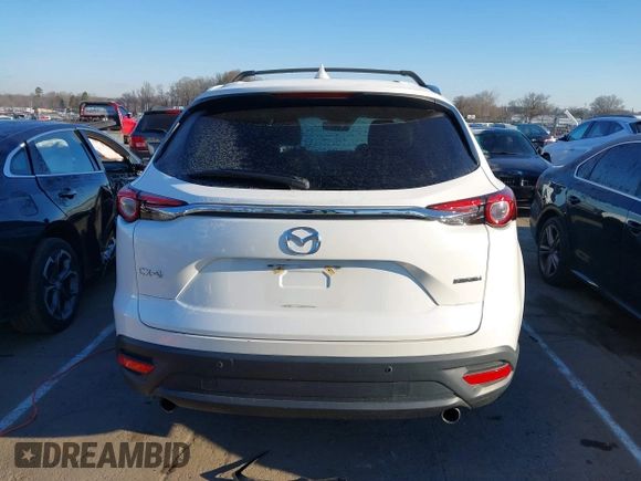 2021 Mazda CX-9 Touring with VIN JM3TCACY4M0522302, listed as a IAAI auction lot 41323543 with 35,223 mi miles and . Bid and sale history available at DreamBid. Image 17.