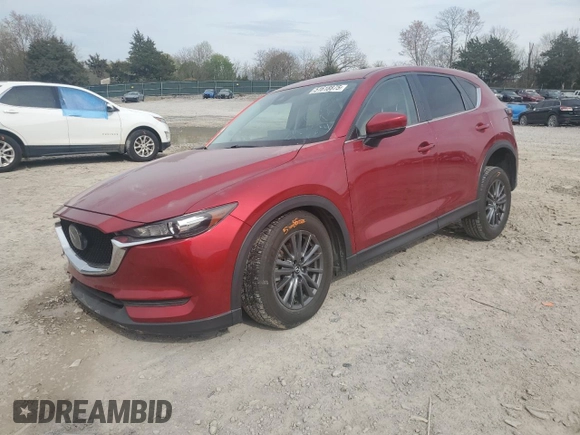 2021 Mazda CX-5 Touring with VIN JM3KFACM7M0334633, listed as a Copart auction lot 51618875 with 70,558 mi miles and Salvage Title. Bid and sale history available at DreamBid. Image 1.