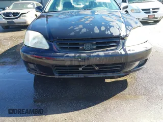 1999 Honda Civic HX with VIN 1HGEJ7123XL068508, listed as a IAAI auction lot 41803733 with 191,412 mi miles. Bid and sale history available at carsss.com. Image 12.