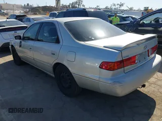 2001 Toyota Camry CE with VIN 4T1BG22K11U111984, listed as a IAAI auction lot 42009171 with 160,082 mi miles. Bid and sale history available at carsss.com. Image 3.