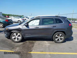 2021 Jeep Cherokee Limited z VIN 1C4PJMDX6MD209395, wystawiony jako IAAI lot #42073746 z przebiegiem 26 627 mil mil oraz . Historia ofert i sprzedaży dostępna na DreamBid. Obrazek 14.