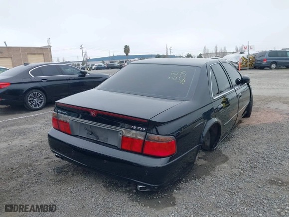 2002 Cadillac Seville Touring STS with VIN 1G6KY54982U239673, listed as a IAAI auction lot 41657709 with 92,224 mi miles. Bid and sale history available at carsss.com. Image 4.