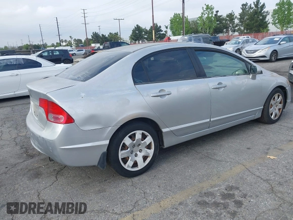 2006 Honda Civic LX with VIN 1HGFA165X6L144003, listed as a IAAI auction lot 42115624 with 310,261 mi miles and . Bid and sale history available at DreamBid. Image 4.