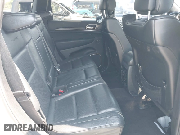 2015 Jeep Grand Cherokee Summit with VIN 1C4RJEJG8FC232253, listed as a IAAI auction lot 42725115 with 133,600 mi miles and . Bid and sale history available at DreamBid. Image 8.