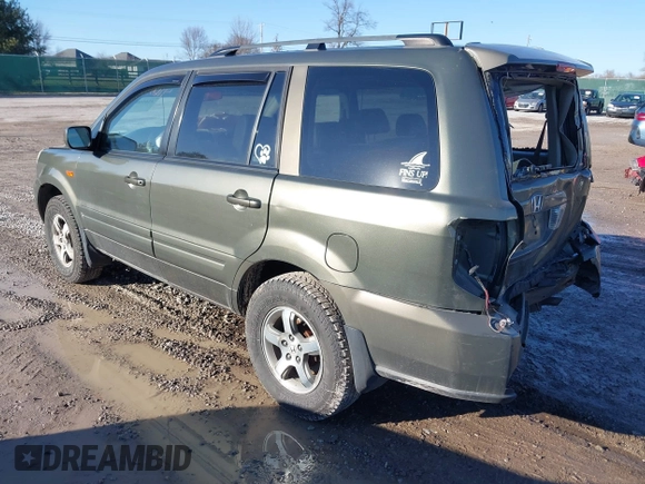 2006 Honda Pilot EX-L with VIN 5FNYF28546B002907, listed as a IAAI auction lot 41650042 with 272,069 mi miles and . Bid and sale history available at DreamBid. Image 3.