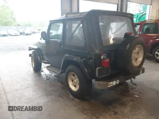 2005 Jeep Wrangler X with VIN 1J4FA39S95P356033, listed as a IAAI auction lot 42252776 with 40,512 mi miles and . Bid and sale history available at DreamBid. Image 3.