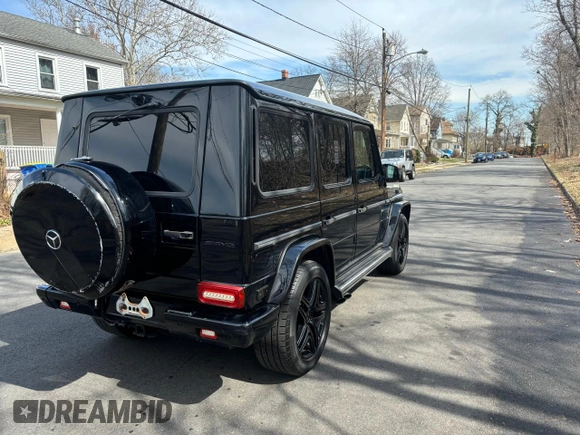 2014 Mercedes-Benz G 63 AMG with VIN WDCYC7DF9EX225480, listed as a Copart auction lot 51272125 with 116,971 mi miles and Clean title. Bid and sale history available at DreamBid. Image 4.