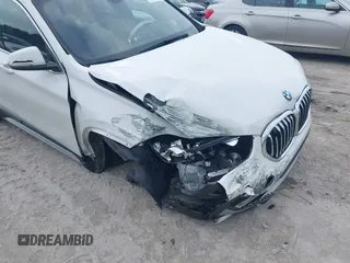 2022 BMW X1 xDrive28i z VIN WBXJG9C0XN5U89973, wystawiony jako IAAI lot #41508343 z przebiegiem 67 424 mil mil oraz . Historia ofert i sprzedaży dostępna na DreamBid. Obrazek 6.
