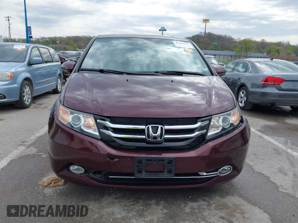 2014 Honda Odyssey Touring with VIN 5FNRL5H9XEB073156, listed as a IAAI auction lot 41990714 with 166,129 mi miles and . Bid and sale history available at DreamBid. Image 12.