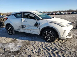 2022 Toyota C-HR XLE with VIN NMTKHMBXXNR143981, listed as a Copart auction lot 42221215 with 52,750 mi miles and Salvage Title. Bid and sale history available at carsss.com. Image 4.
