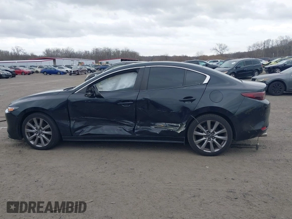 2019 Mazda 3 w/Select with VIN 3MZBPAAL4KM108590, listed as a IAAI auction lot 41726873 with 90,257 mi miles and . Bid and sale history available at carsss.com. Image 14.