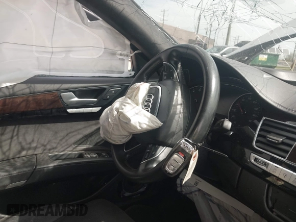 2016 Audi A8 Sport z VIN WAU43AFD0GN011518, wystawiony jako IAAI lot #42096343 z przebiegiem Nie podano mil oraz . Historia ofert i sprzedaży dostępna na DreamBid. Obrazek 11.