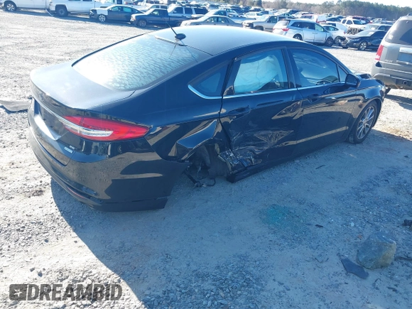 2017 Ford Fusion SE with VIN 3FA6P0HD9HR137825, listed as a IAAI auction lot 41737647 with 128,545 mi miles and . Bid and sale history available at DreamBid. Image 4.