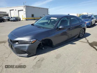 2023 Honda Civic EX-L z VIN 19XFL1H7XPE013896, wystawiony jako Copart lot #57056295 z przebiegiem 16 976 mil mil oraz Szkoda całkowita • Salvage title. Historia ofert i sprzedaży dostępna na DreamBid. Obrazek 1.