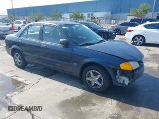 1999 Mazda Protege DX z VIN JM1BJ2229X0189290, wystawiony jako IAAI lot #41796448 z przebiegiem 281 528 mil mil oraz . Historia ofert i sprzedaży dostępna na DreamBid. Obrazek 1.