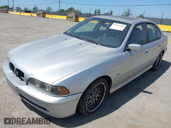 2001 BMW 5 Series 530iA with VIN WBADT63411CF01165, listed as a IAAI auction lot 42101589 with 151,243 mi miles. Bid and sale history available at carsss.com. Image 2.