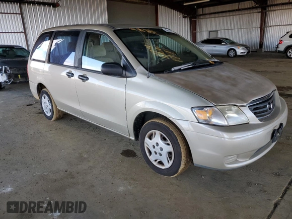 2000 Mazda MPV DX with VIN JM3LW28G8Y0142883, listed as a Copart auction lot 82633154 with 161,196 mi miles and Salvage title. Bid and sale history available at DreamBid. Image 4.