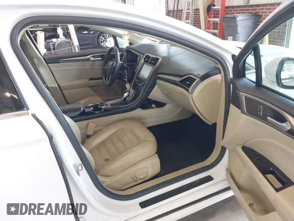 2014 Ford Fusion SE with VIN 3FA6P0HD8ER372731, listed as a IAAI auction lot 39915643 with 136,635 mi miles and . Bid and sale history available at DreamBid. Image 5.