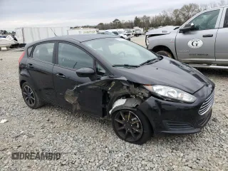 2018 Ford Fiesta SE with VIN 3FADP4EJ9JM105808, listed as a Copart auction lot 87927755 with 104,055 mi miles and Salvage Title. Bid and sale history available at DreamBid. Image 4.