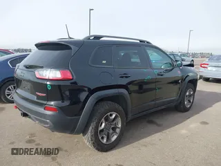 2019 Jeep Cherokee Trailhawk Elite with VIN 1C4PJMBX0KD395421, listed as a IAAI auction lot 41265048 with 70,070 mi miles. Bid and sale history available at carsss.com. Image 4.