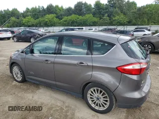 2013 Ford C-Max Energi SEL with VIN 1FADP5CU7DL557250, listed as a Copart auction lot 59852894 with 121,428 mi miles and Salvage Title. Bid and sale history available at carsss.com. Image 2.