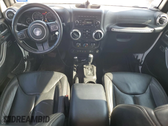 2015 Jeep Wrangler Unlimited Rubicon with VIN 1C4BJWFG1FL750561, listed as a Copart auction lot 60797075 with 95,677 mi miles and Salvage title. Bid and sale history available at DreamBid. Image 8.