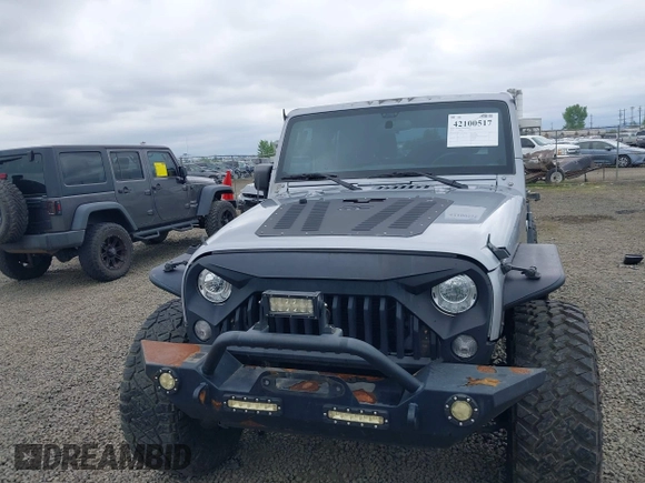 2018 Jeep Wrangler Unlimited Sport S with VIN 1C4BJWDG4JL861052, listed as a IAAI auction lot 42100517 with 43,907 mi miles and . Bid and sale history available at DreamBid. Image 13.