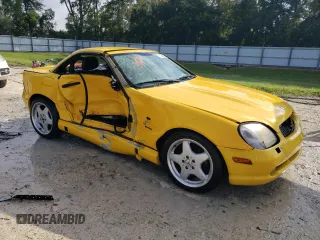 1999 Mercedes-Benz SLK-Class with VIN WDBKK47F9XF076441, listed as a Copart auction lot 73745154 with 104,481 mi miles and Salvage Title. Bid and sale history available at carsss.com. Image 4.