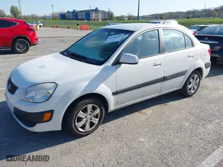 2009 Kia Rio SX with VIN KNADE223696518580, listed as a IAAI auction lot 41990650 with 1 mi miles. Bid and sale history available at carsss.com. Image 2.