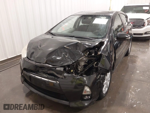 2012 Toyota Prius c One with VIN JTDKDTB35C1009930, listed as a IAAI auction lot 41961471 with 174,252 mi miles. Bid and sale history available at carsss.com. Image 6.