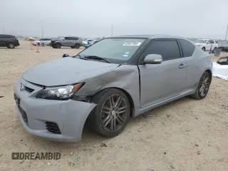 2012 Scion tC z VIN JTKJF5C74C3044622, wystawiony jako Copart lot #42857995 z przebiegiem 95 703 mil mil oraz Szkoda całkowita • Salvage title. Historia ofert i sprzedaży dostępna na DreamBid. Obrazek 1.