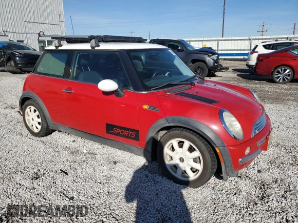 2004 MINI Hardtop with VIN WMWRC33434TC53820, listed as a Copart auction lot 85389994 with 164,452 mi miles and Salvage Title. Bid and sale history available at DreamBid. Image 4.