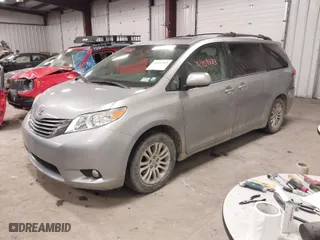 2013 Toyota Sienna XLE AAS with VIN 5TDYK3DC0DS370760, listed as a IAAI auction lot 41409383 with 213,198 mi miles. Bid and sale history available at carsss.com. Image 2.