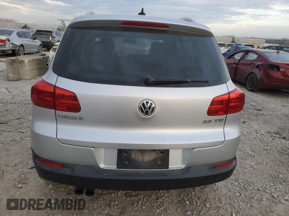 2012 Volkswagen Tiguan LE z VIN WVGAV7AX7CW520378, wystawiony jako Copart lot #86388514 z przebiegiem 95 653 mil mil oraz Czysty tytuł • Clean title. Historia ofert i sprzedaży dostępna na DreamBid. Obrazek 6.