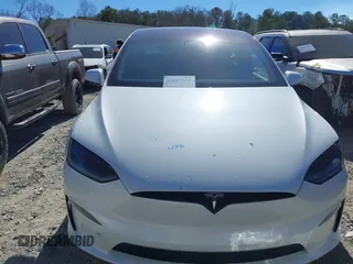 2023 Tesla Model X with VIN 7SAXCDE54PF430808, listed as a IAAI auction lot 41667924 with 21,100 mi miles and . Bid and sale history available at DreamBid. Image 12.