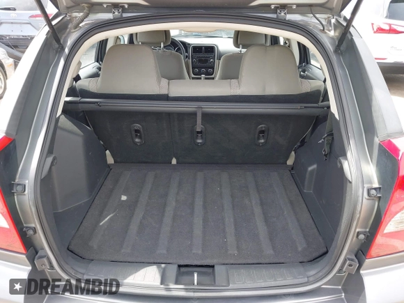 2012 Dodge Caliber SXT with VIN 1C3CDWDA6CD506019, listed as a IAAI auction lot 41999560 with 146,446 mi miles and . Bid and sale history available at DreamBid. Image 18.