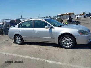 2006 Nissan Altima 2.5 with VIN 1N4AL11D96N412812, listed as a IAAI auction lot 42398083 with 214,369 mi miles and . Bid and sale history available at DreamBid. Image 12.
