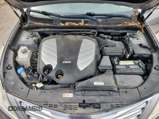 2013 Hyundai Azera z VIN KMHFG4JG9DA217664, wystawiony jako Copart lot #60855945 z przebiegiem 115 623 mil mil oraz Czysty tytuł • Clean title. Historia ofert i sprzedaży dostępna na DreamBid. Obrazek 11.