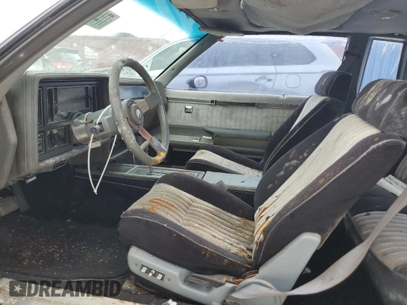 1986 Buick Regal with VIN 1G4GK4775GP227474, listed as a Copart auction lot 77446764 with 43,120 mi miles and Salvage Title. Bid and sale history available at DreamBid. Image 7.