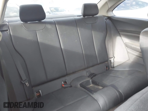 2015 BMW 2 Series 228i with VIN WBA1F9C56FVW98461, listed as a IAAI auction lot 41663193 with 94,584 mi miles. Bid and sale history available at carsss.com. Image 8.